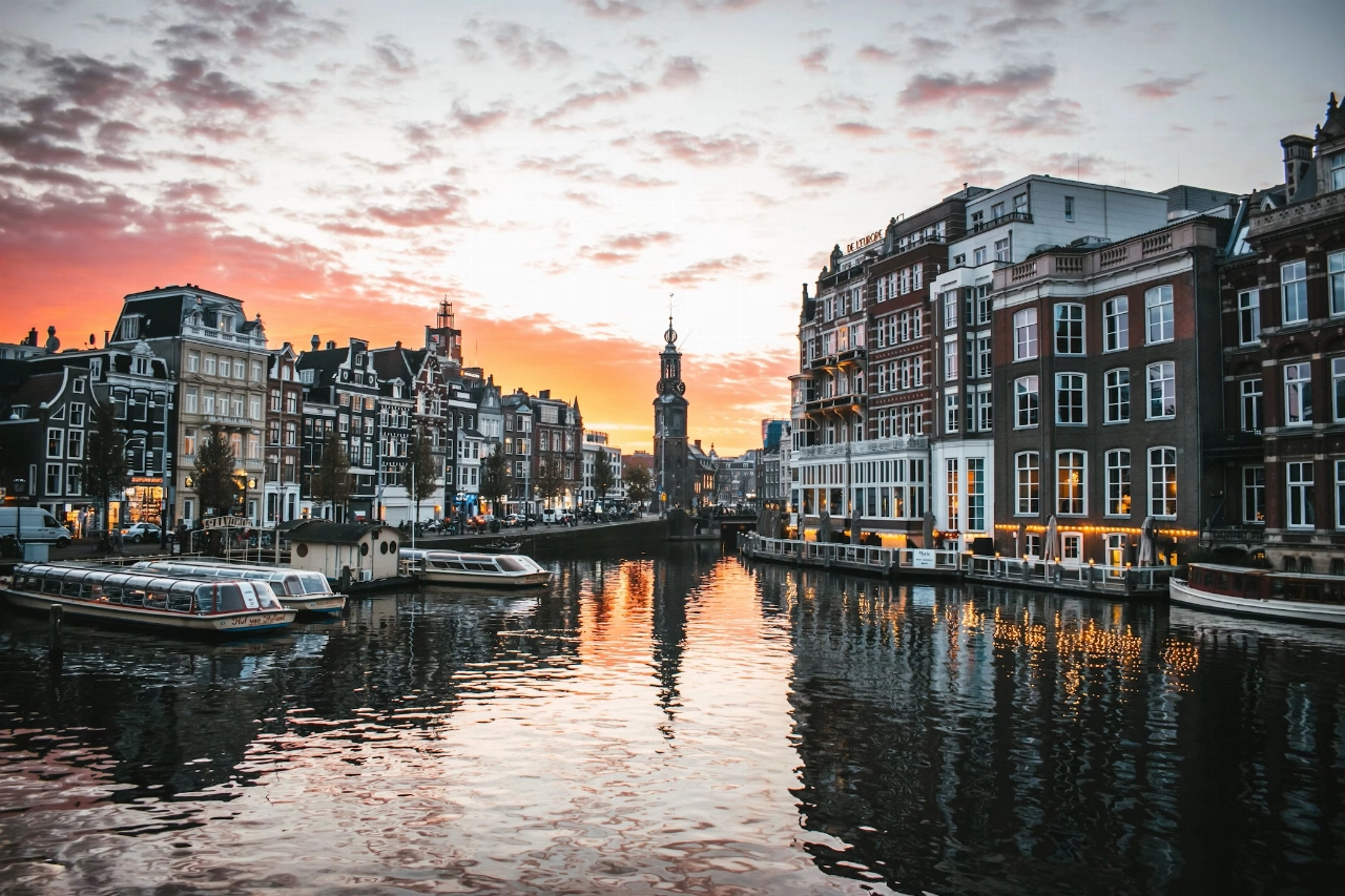 De mooiste zonsondergangen van Amsterdam: hier moet je zijn