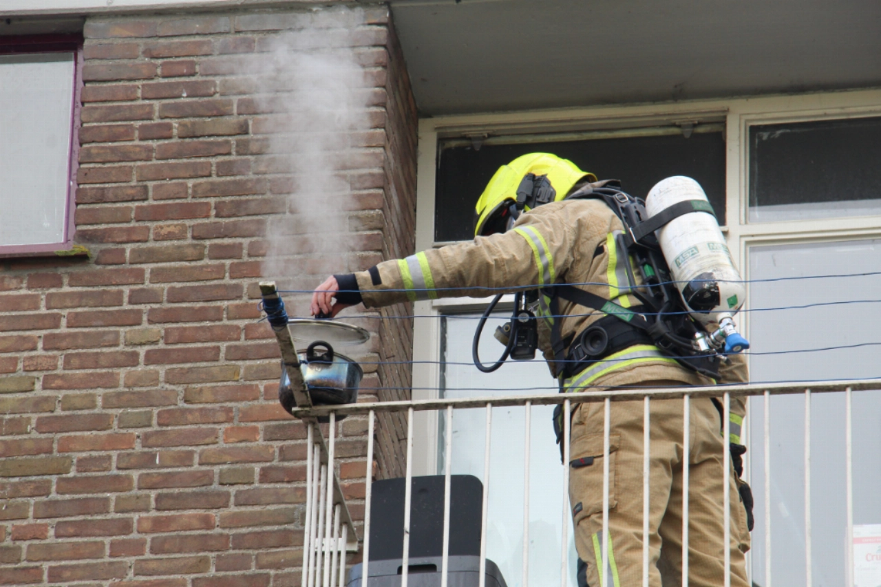 Brand in woning door vlam in de pan