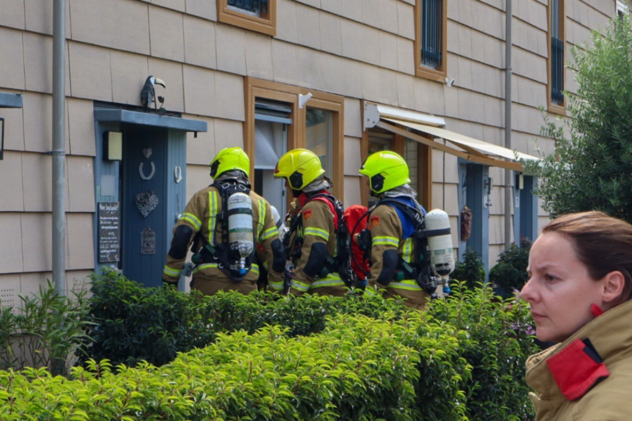 Elektrische step in brand in woning