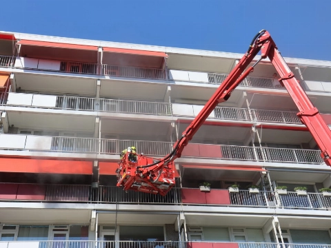 Brand in flatwoning Burgemeester van Walsumlaan