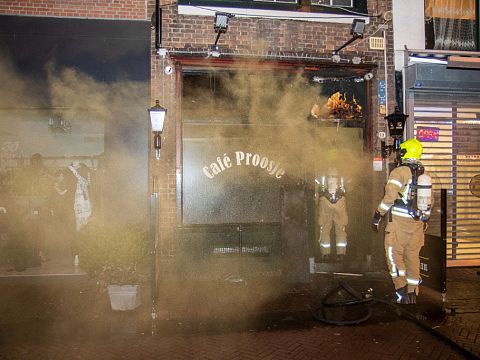 Forse schade in café Proosje na brandstichting