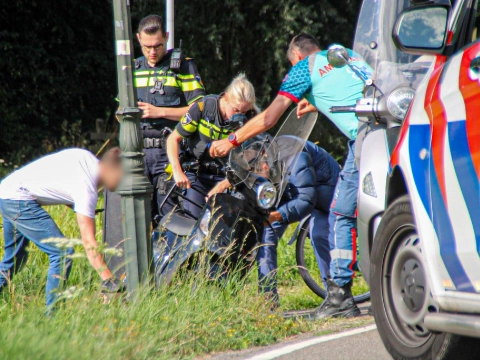 Botsing tussen bakfiets en scooter