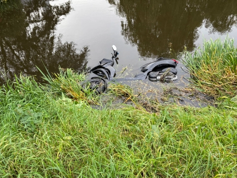 Motorscooter te water